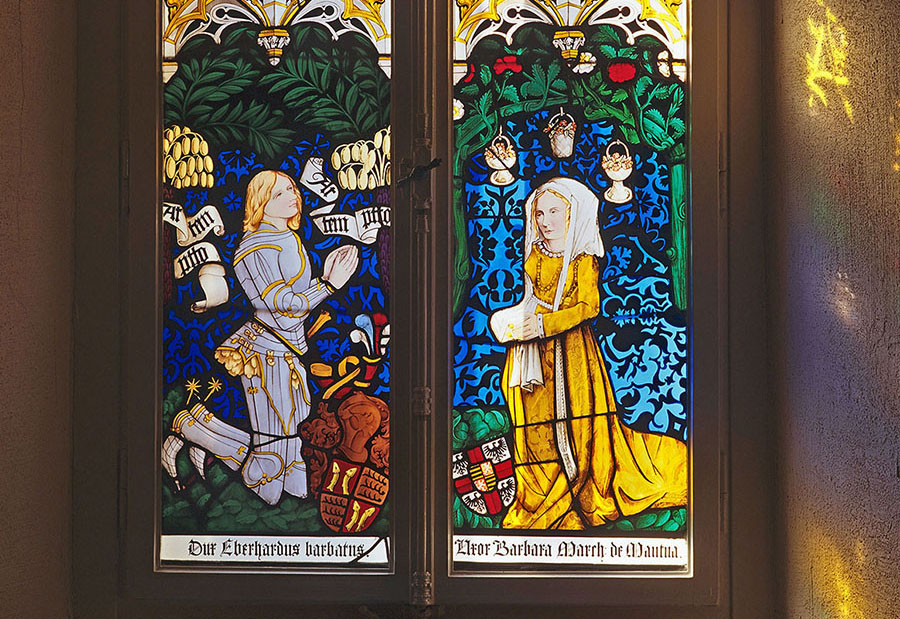 Graf Eberhard im Bart und seine Ehefrau Barbara Gonzaga von Mantua, Glasfenster im Alten Schloss von Stuttgart nach dem Original in der Tübinger Stiftskirche. Quelle LMZ BW