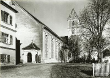 Die ehem. Stiftskirche und heutige Pfarrkirche St. Cornelius und Cyprian mit altem Portaleingang, 1930.