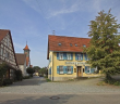 Rosengarten-Tullau: Dorfplatz mit Wirtshaus und Kirche 2004